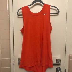 orange Nike workout top
